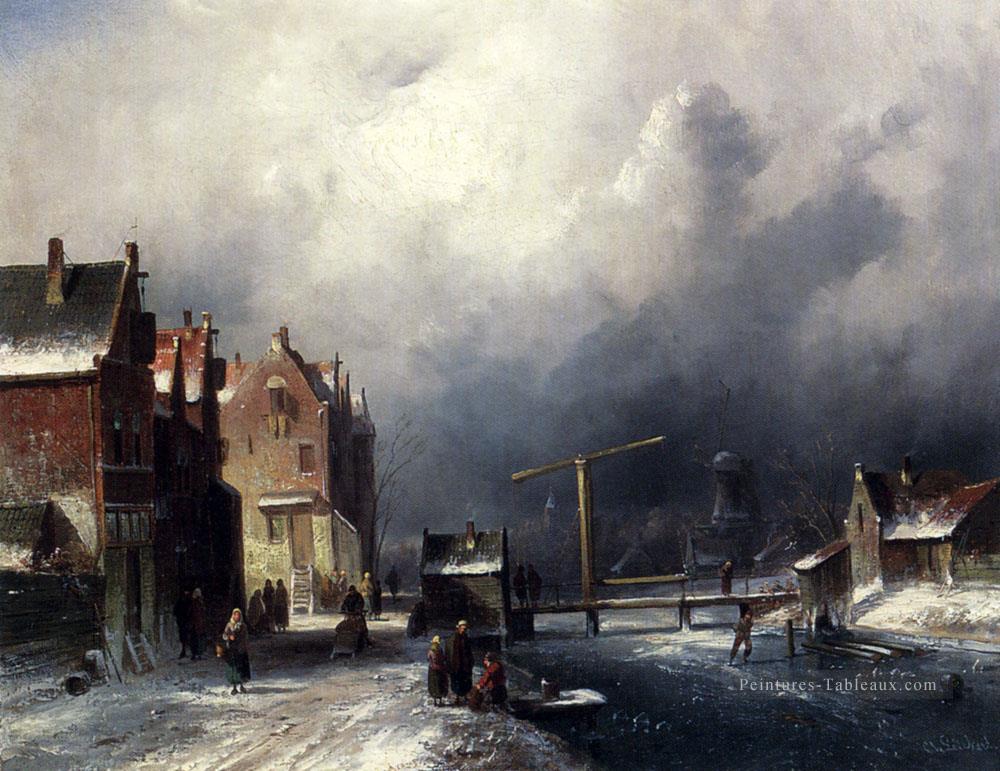 Figures dans une ville néerlandaise par un paysage gelé paysage Charles Leickert Peintures à l'huile